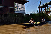 Inle Lake Myanmar. All the buildings are constructed on piles. Residents travel around by canoe, but there are also bamboo walkways and bridges over the canals, monasteries and stupas. 